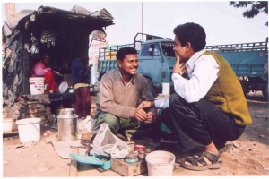 Rev Anjan Jena Pastor of the Salom Bible Presbyterian Church reaching out to his neighbour who turned to Christ and is now a deacon at SBPC, Delhi.